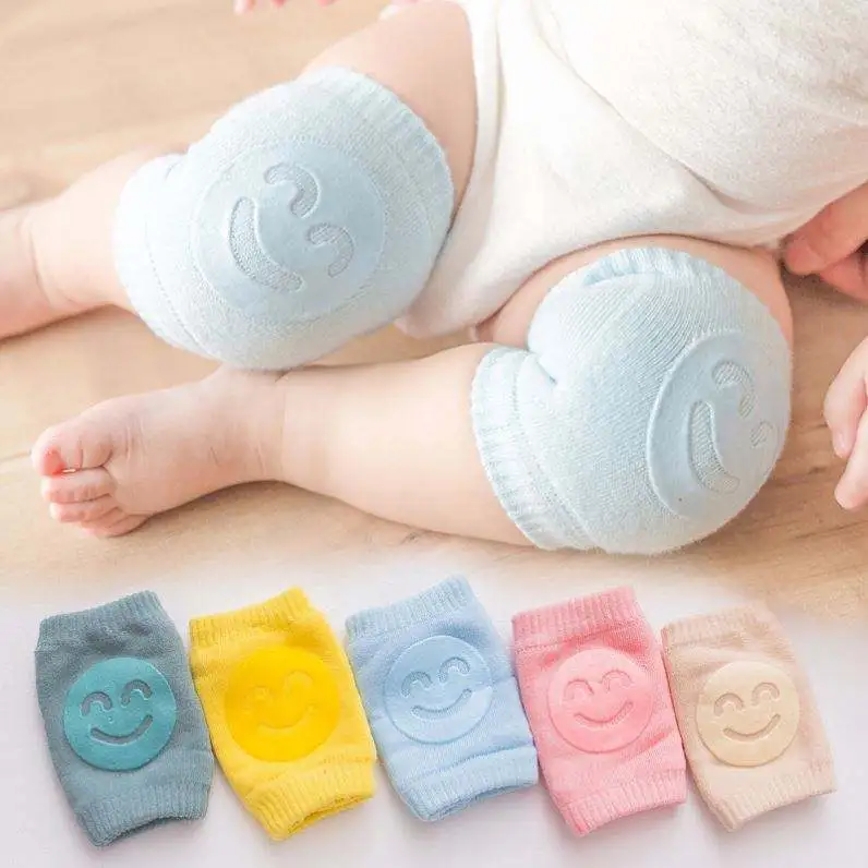 Baby wearing anti-slip crawling knee pads, available in five colours