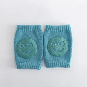 Anti-slip baby crawling knee pads pair in teal with smiley grip