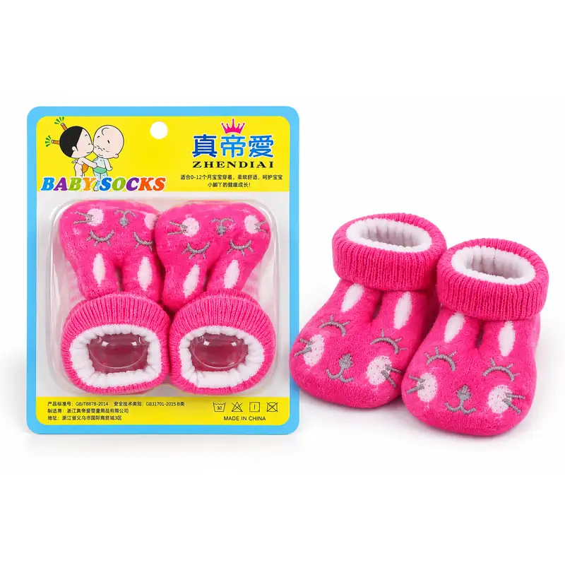 Pink bunny baby bootie socks with fold-over cuff, pack and pair